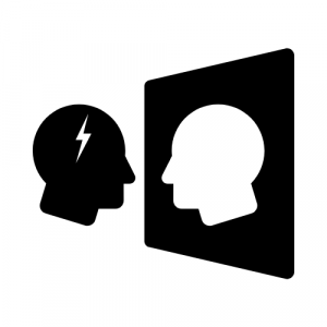 Mirror image of a leader in black and white with a lightning bolt symbolizing self awareness